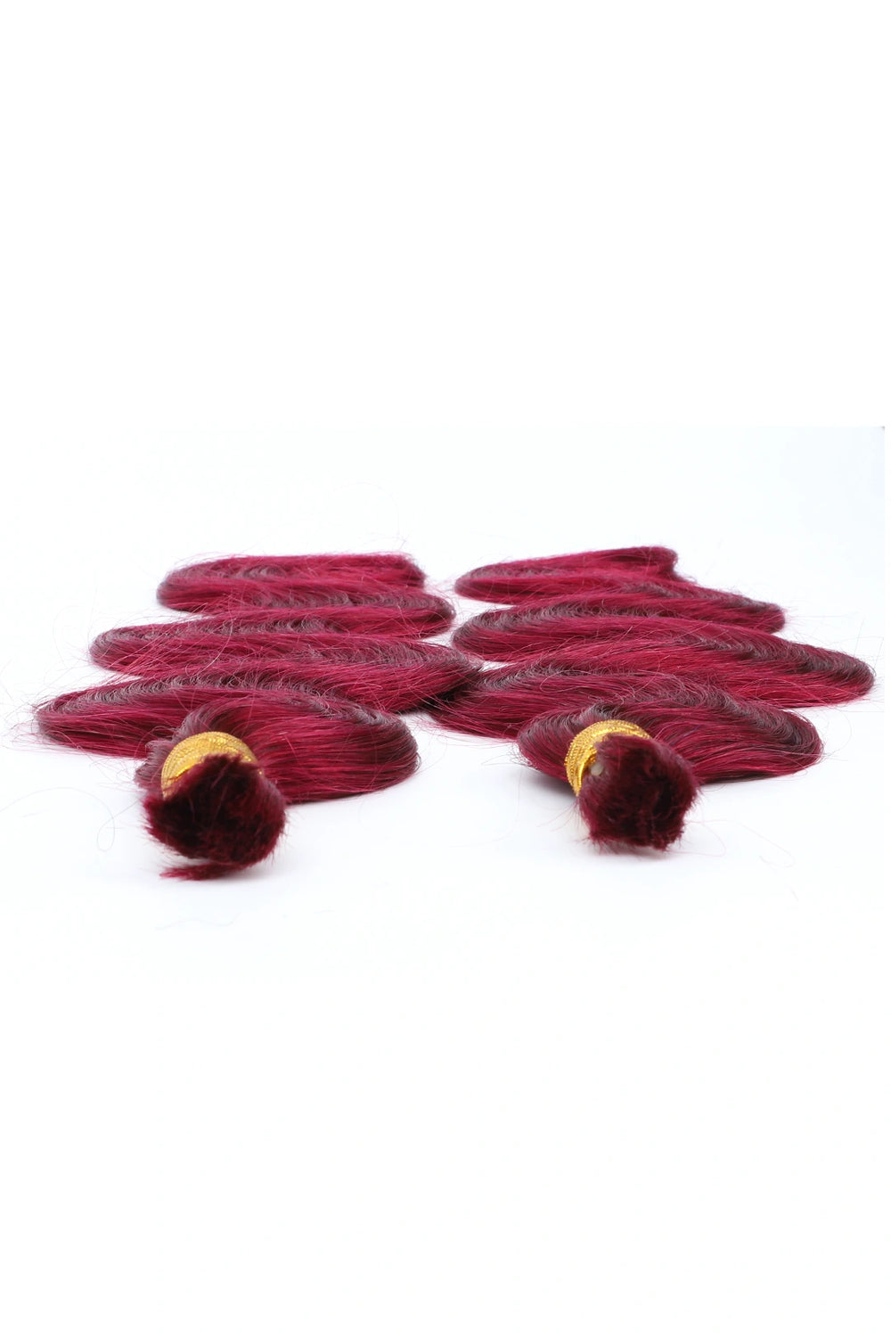 Detail of the ends of burgundy 99j body wave bulk human hair for braiding bu28