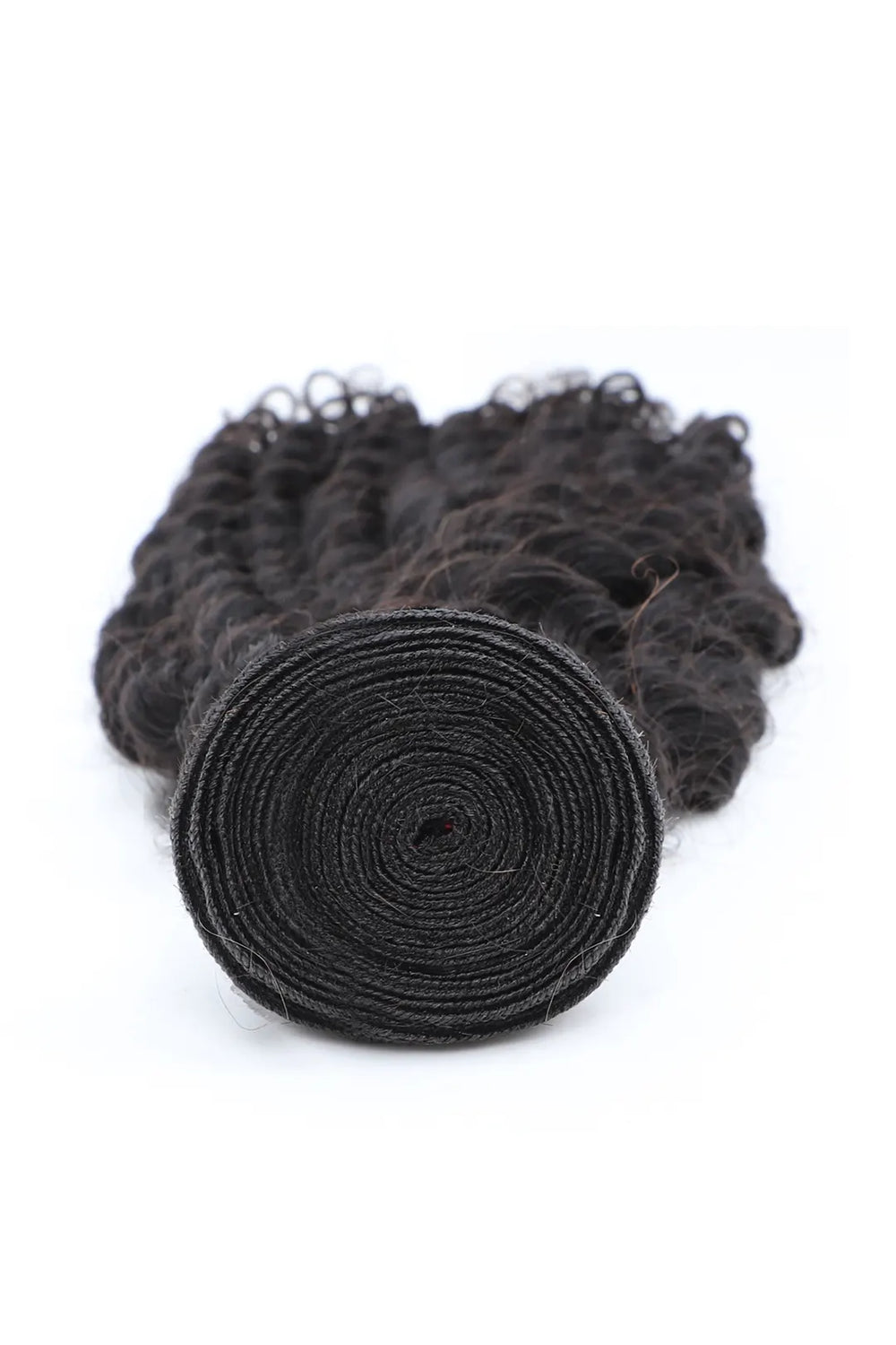 Detail of the ends of Brazilian hair bundles sew in extensions curly