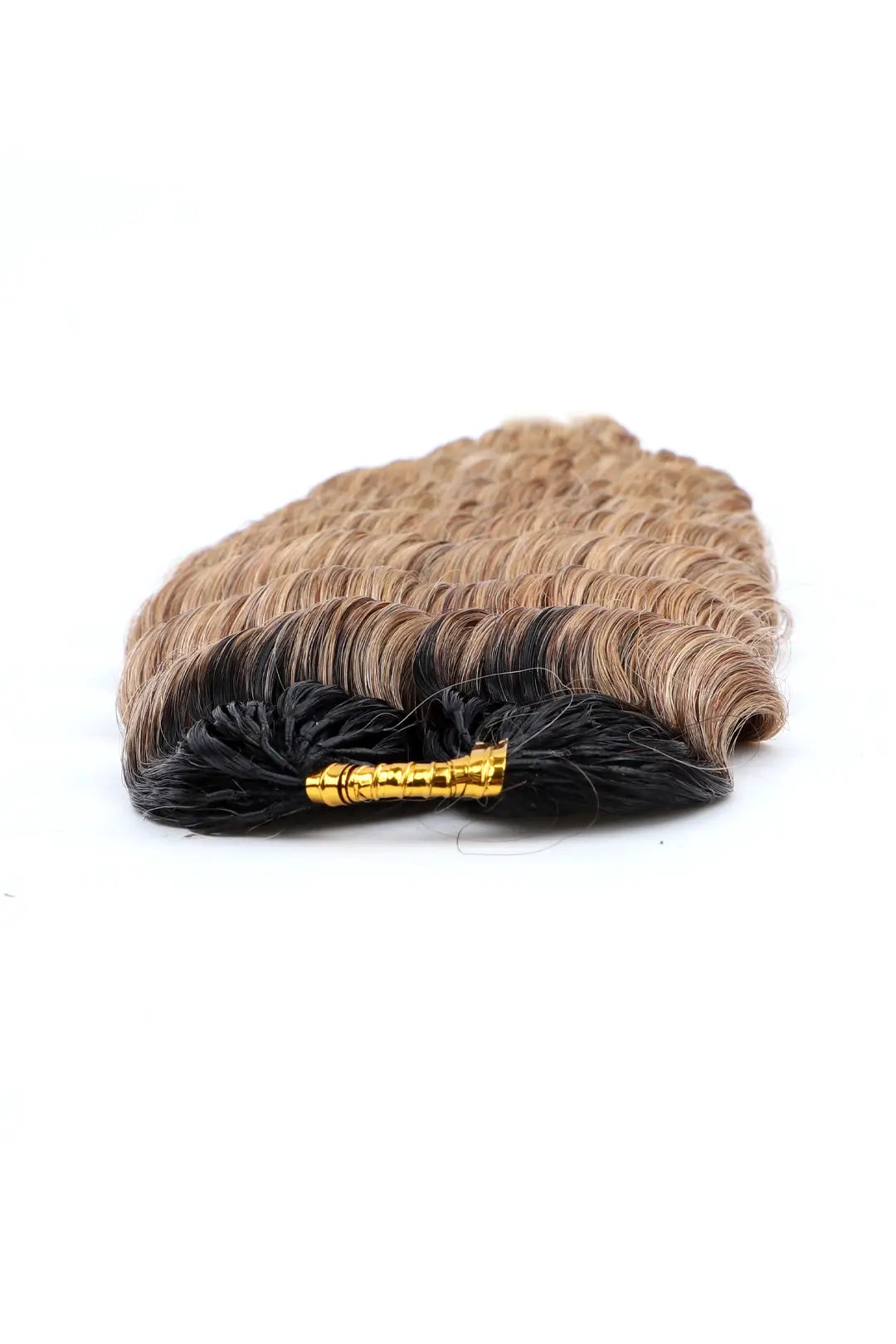 Detail of the ends of T1B/27 honey blonde deep wave feather crochet human hair