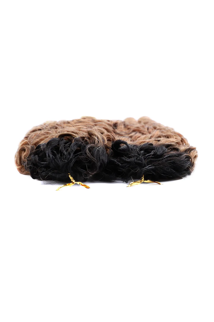 Detail of the ends of auburn brown ombre burmese curly with spiral curls feather crochet hair T1B/30 human hair
