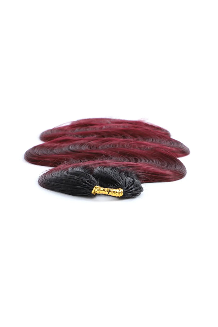 Detail of the ends of burgundy ombre body wave feather crochet hair - 1B/99J human hair