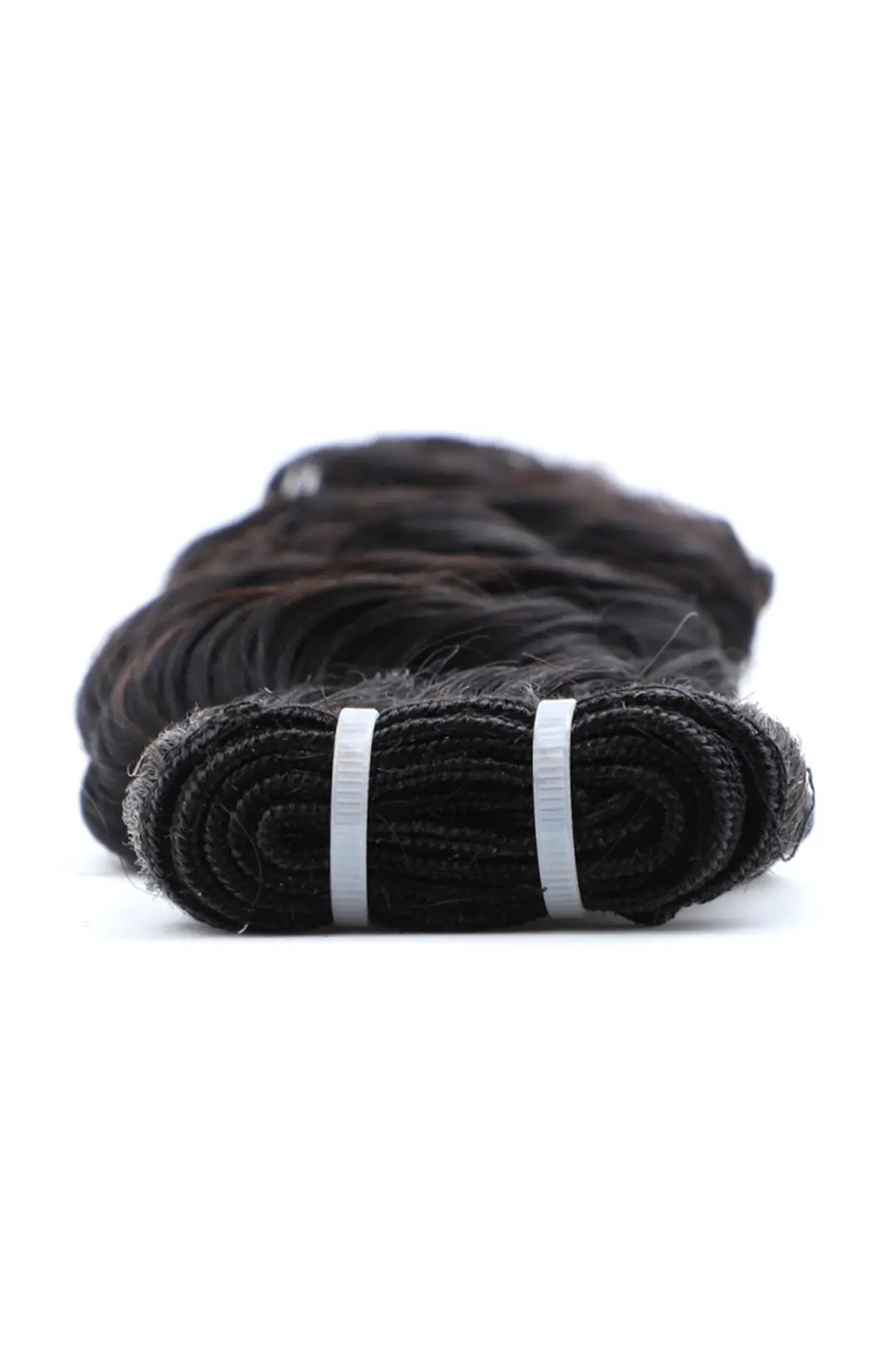 Detail of the ends of cambodia virgin hair bundles sew in extensions loose wave