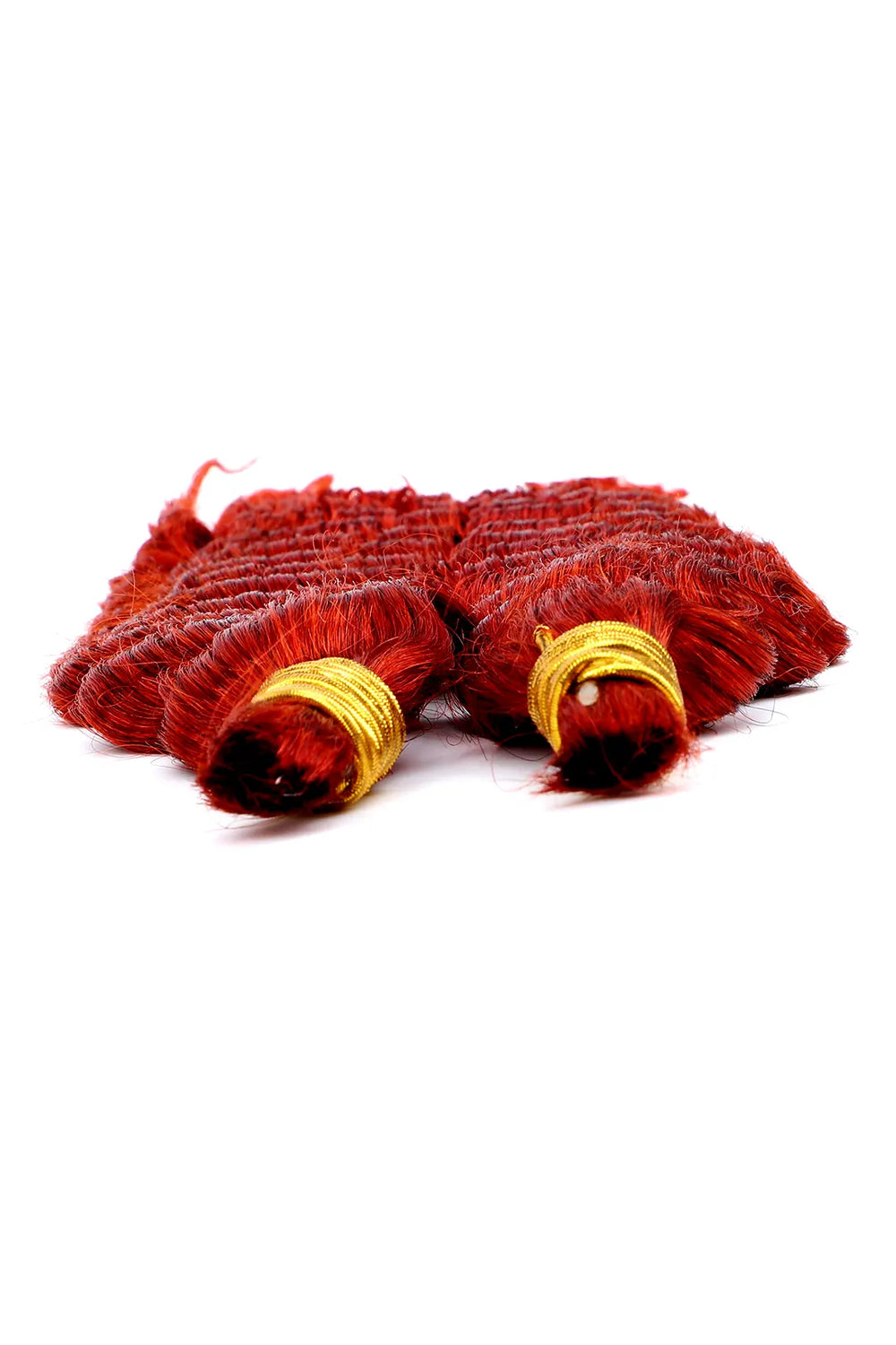 Detail of the ends of copper red deep wave bulk human hair for braiding bu23