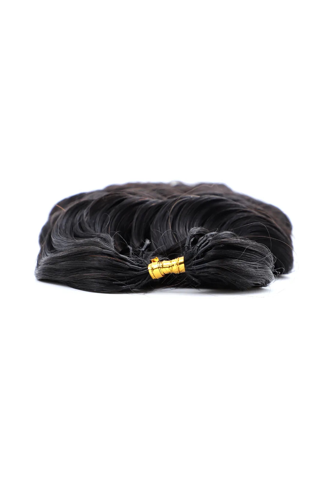 Detail of the ends of feather crochet hair extension loose wave human hair