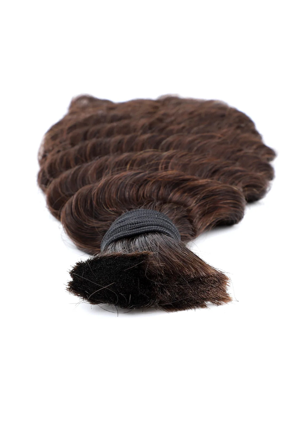 Detail of the ends of the dark brown deep wave bulk human hair for braiding