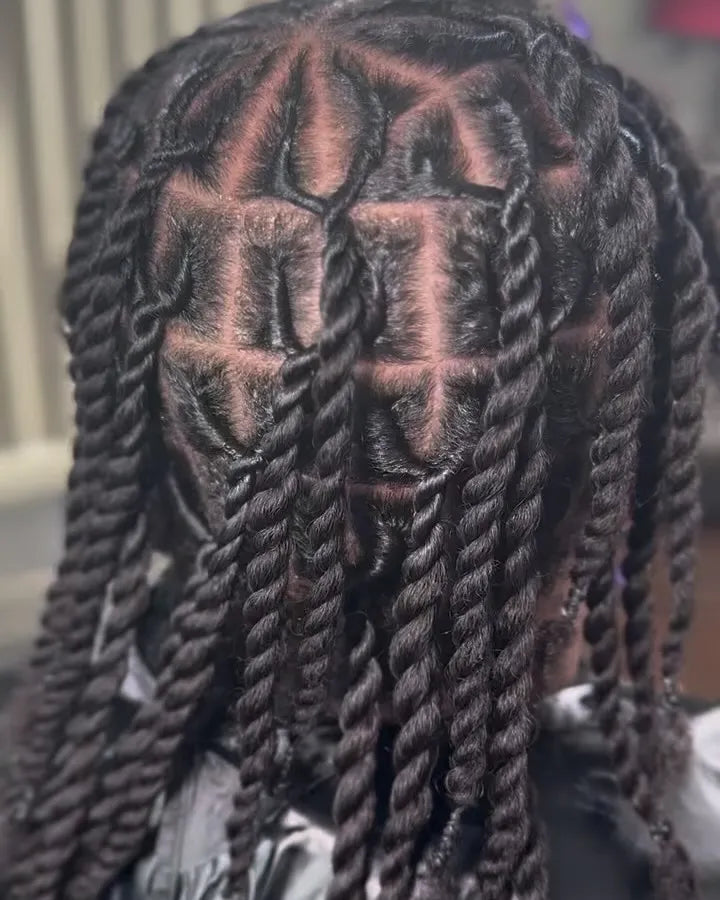 Medium two-strand twists with clean geometric box and diamond parting, hairstylist located in Fairview Heights, IL