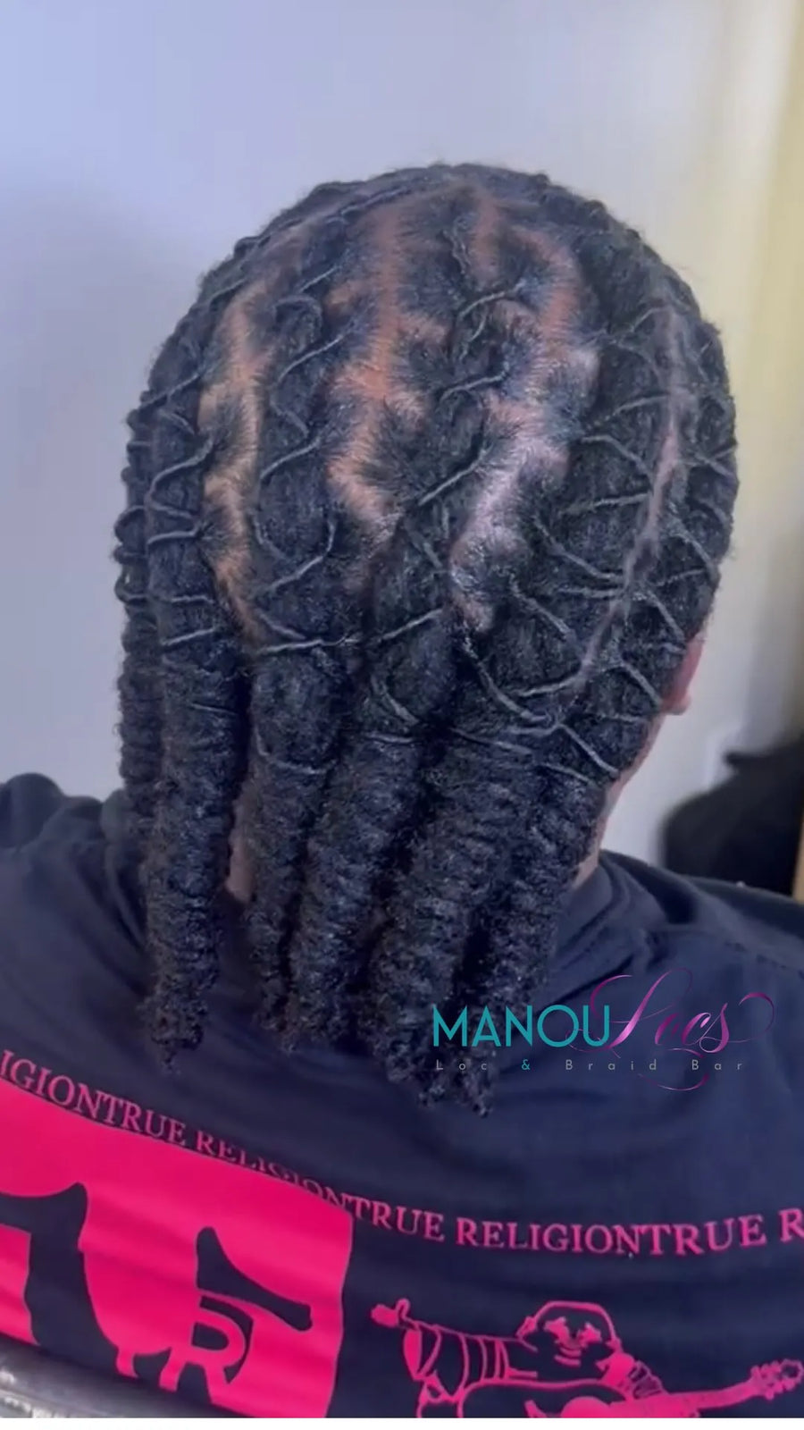 Brown and red starter loc retwist with clean parting, hairstylist in Atlanta, GA