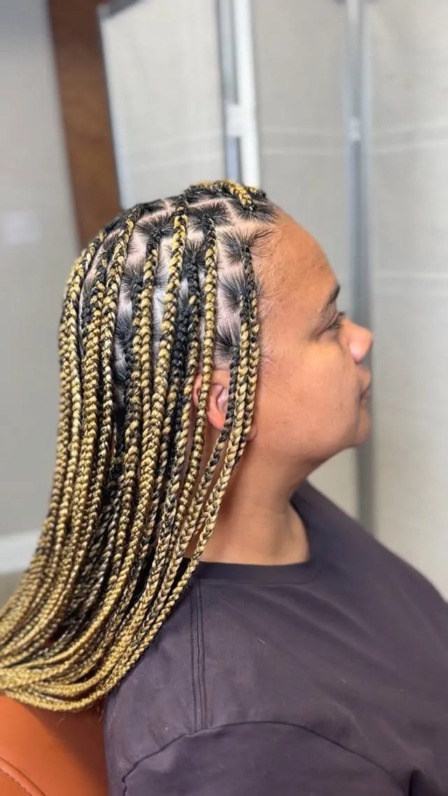 Blonde and black small box braids with clean square parting, hairstylist in Zachary, LA