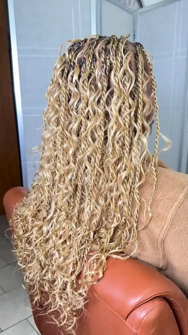 Platinum blonde boho braids with loose curls and wavy ends, hairstylist in Zachary, LA