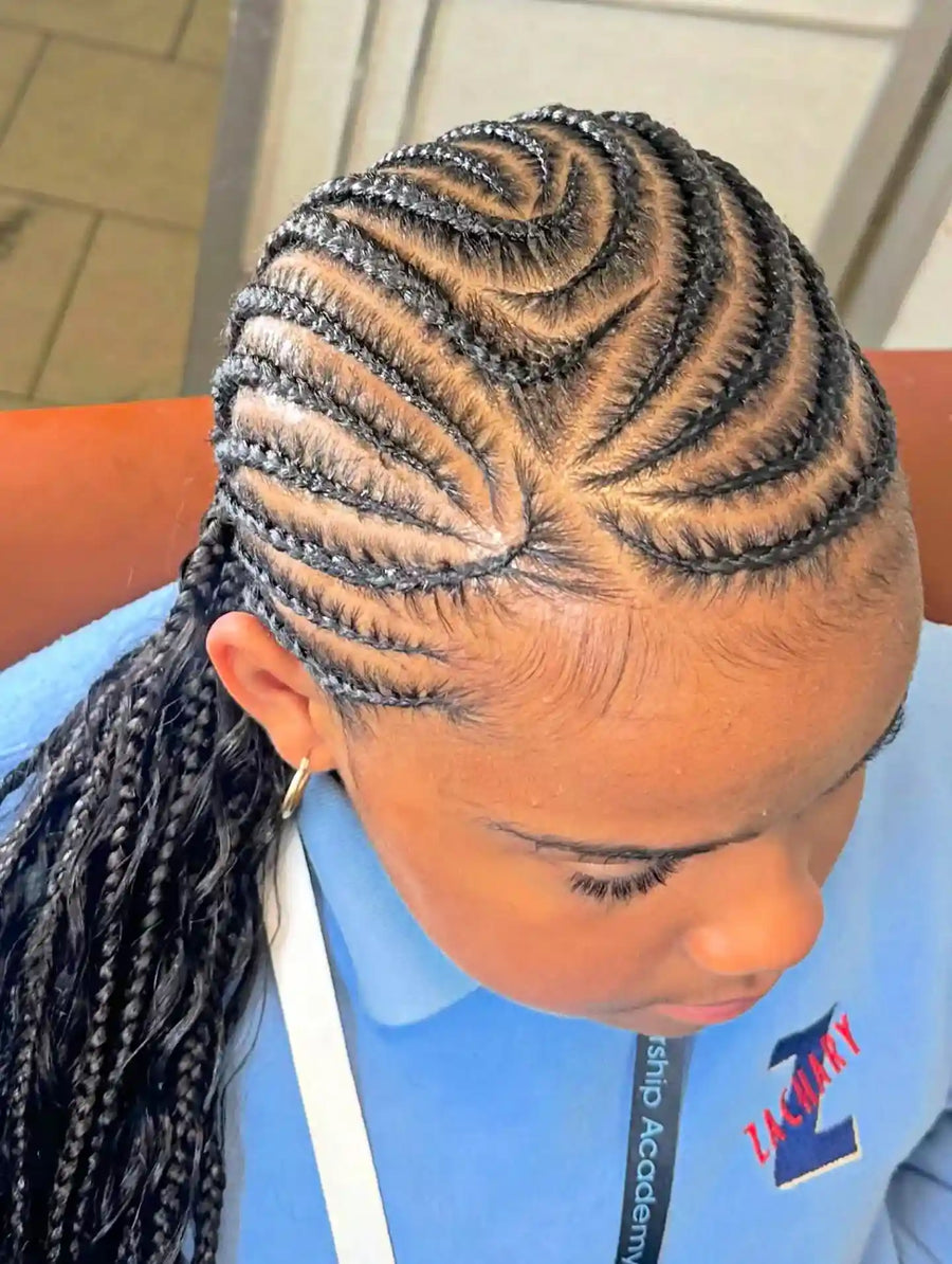 Feed-in cornrow braids with curved side design and long braid length, hairstylist in Zachary, LA