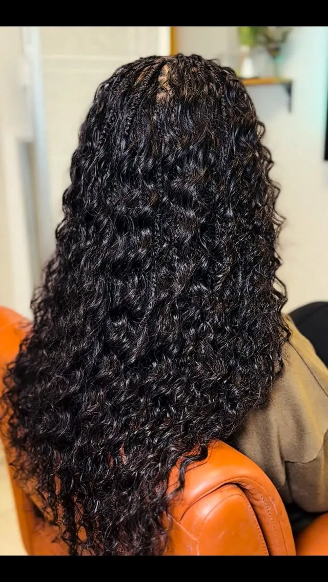 Long black curly boho braids with wet-look waves, hairstylist in Zachary, LA