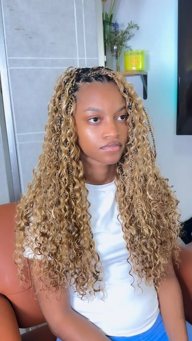 Blonde boho knotless braids with loose curls and face-framing pieces, hairstylist in Zachary, LA