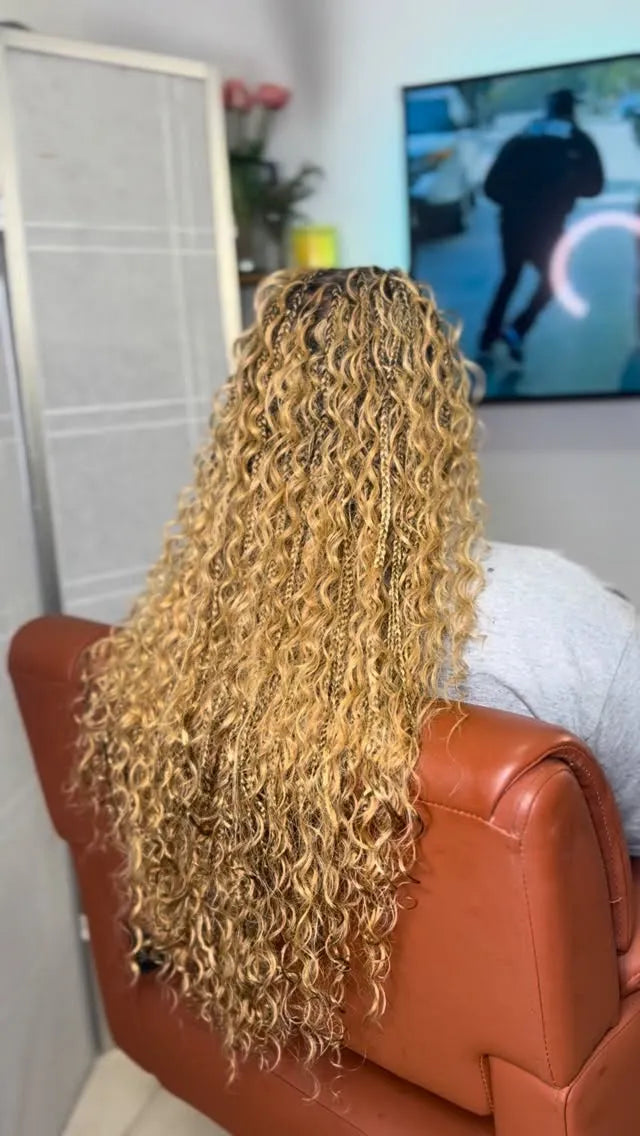 Long blonde boho braids with full curly texture, hairstylist in Zachary, LA