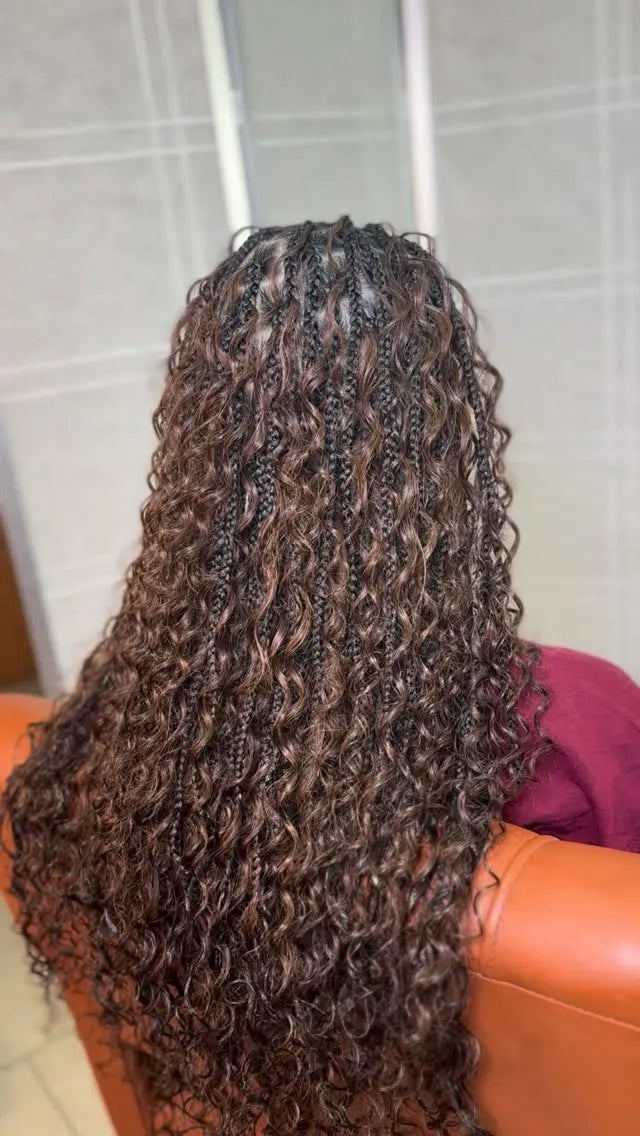 Brown boho braids with loose curls and blended highlights, hairstylist in Zachary, LA