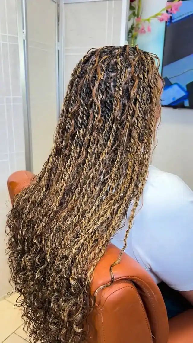Long blonde and brown boho braids with wavy curly texture, hairstylist in Zachary, LA