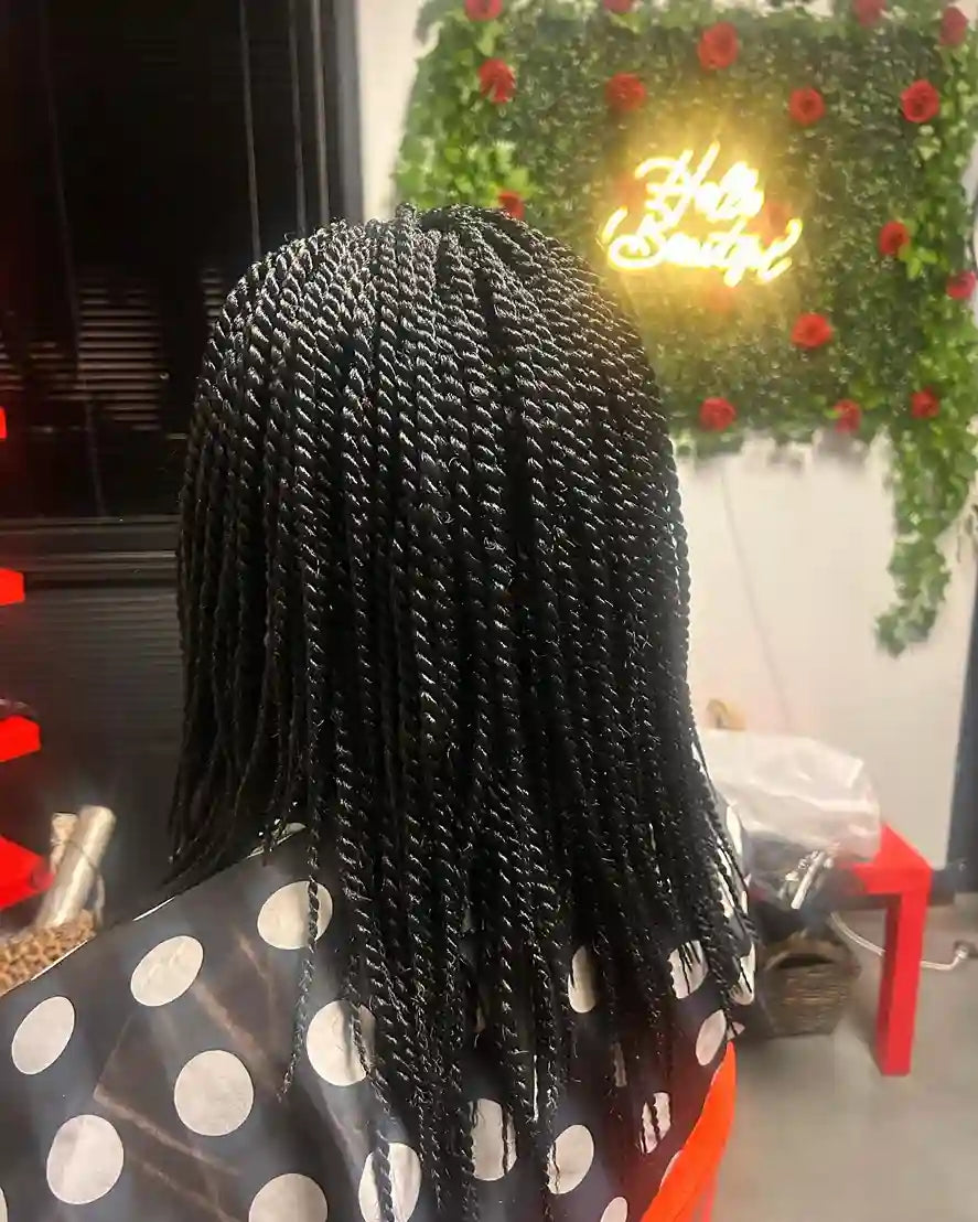 Shoulder-length black two-strand twists with a neat full-bodied finish, hairstylist located in Glendale, AZ