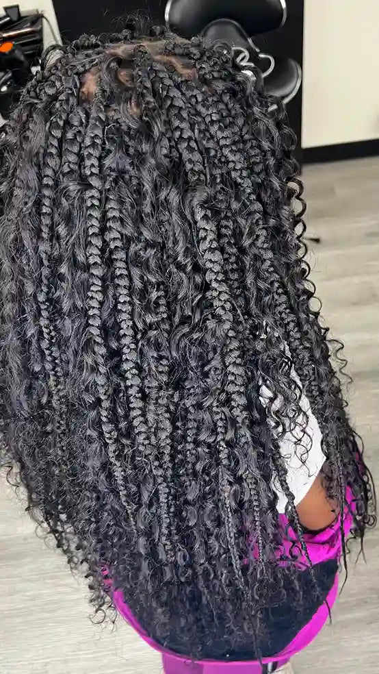 Boho knotless braids with curly ends, hairstylist located in Philadelphia, PA