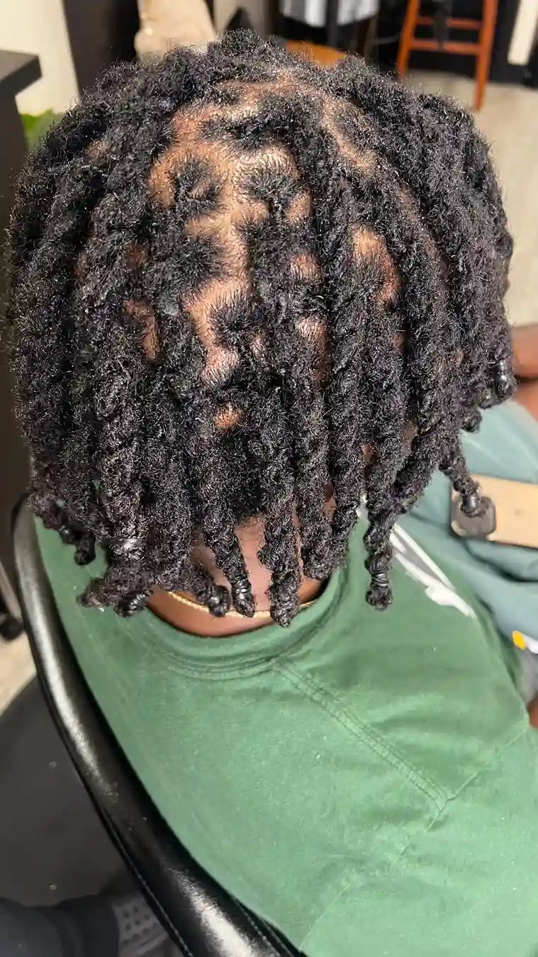 Short starter locs with clean parted sections, hairstylist located in Philadelphia, PA