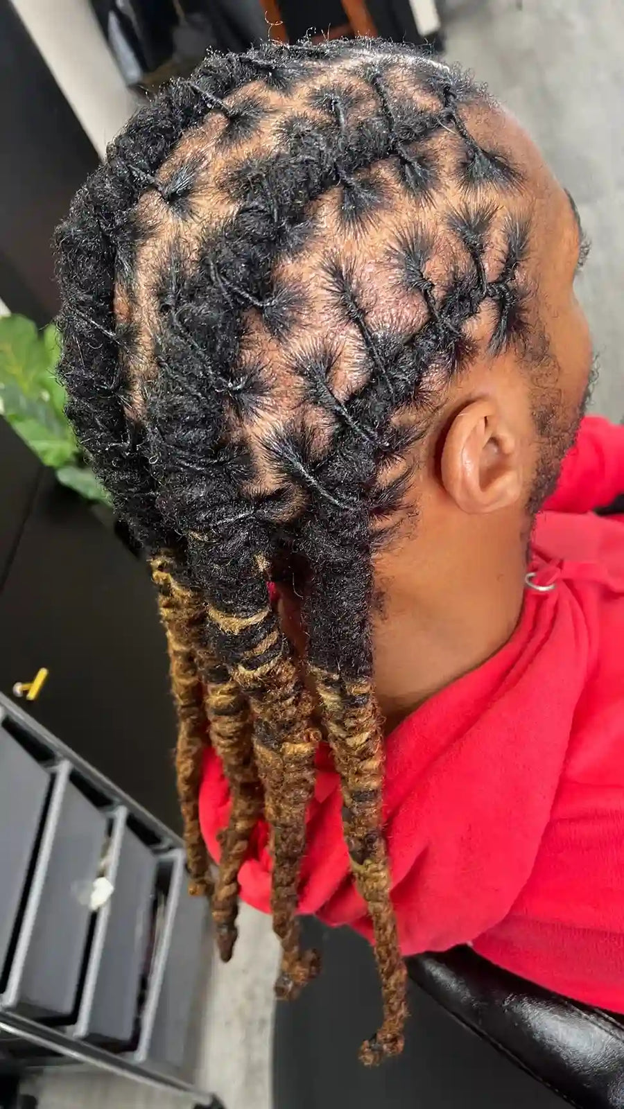 Men’s barrel twist loc style with two tone dreadlocks, hairstylist located in Philadelphia, PA