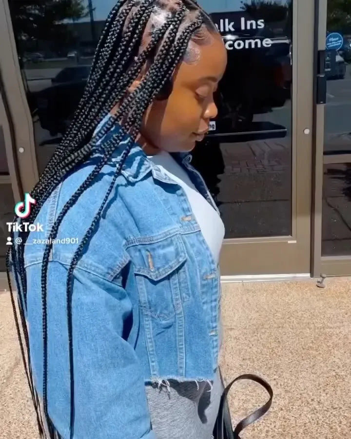 Long black box braids with clean square parts and laid edges, hairstylist in Memphis, TN