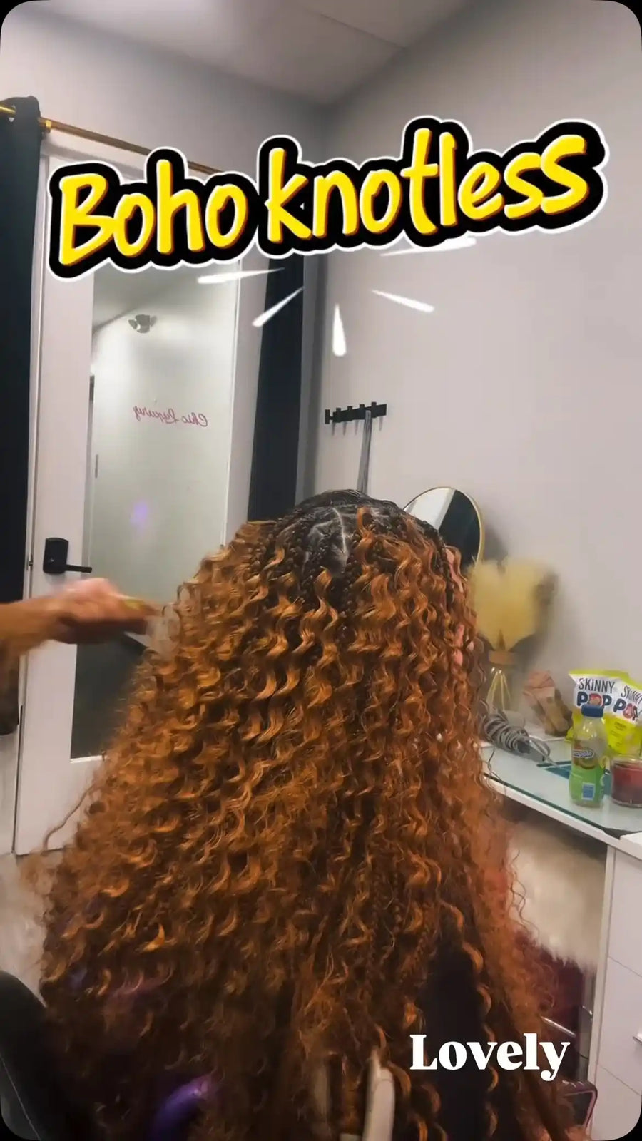 Auburn boho knotless braids with defined curls and clean square parting, hairstylist located in Franklin Square, NY