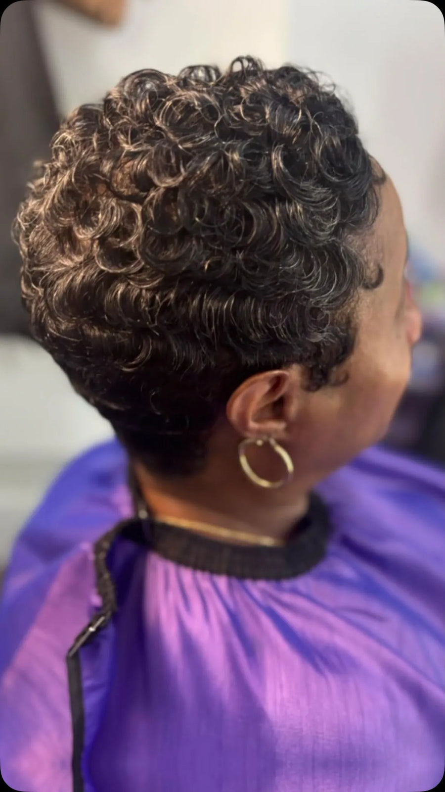 Short black curly pixie cut with sculpted finger waves and defined pin curls, hairstylist located in Chesterfield, VA