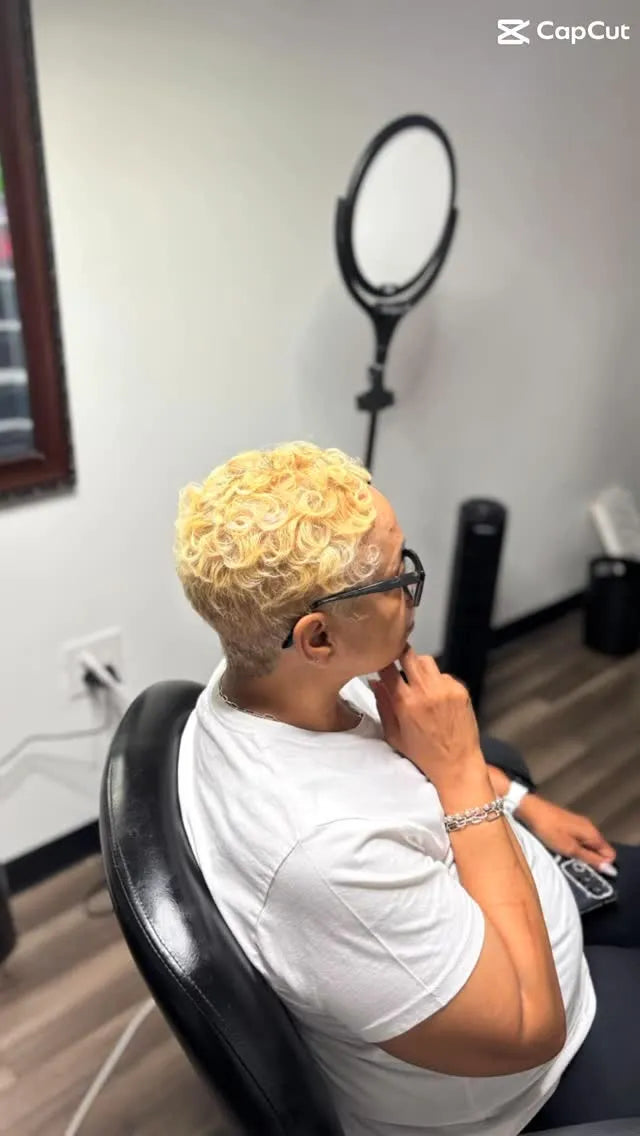 Blonde tapered pixie cut with soft finger waves and defined curls, hairstylist located in Chesterfield, VA