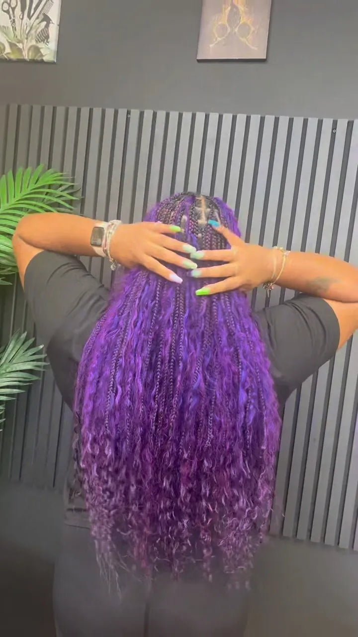 Long purple boho knotless braids with loose curls, hairstylist located in Reisterstown, MD