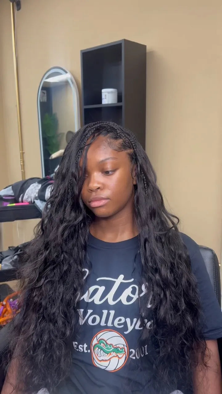 Long black boho braids with side part and wavy curls, hairstylist located in Reisterstown, MD