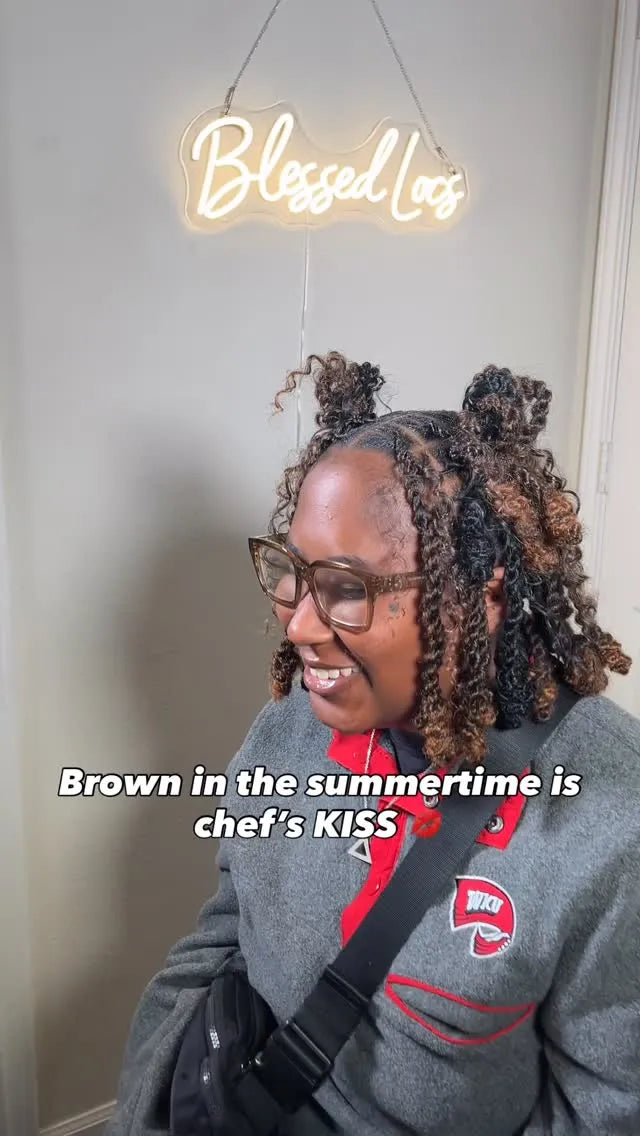 Long black boho locs with loose spiral curls and braided roots, Stylist located in Bowling Green, KY
