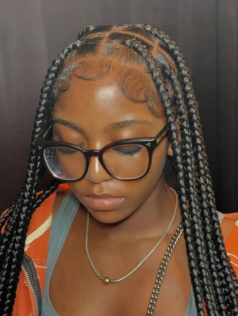 Long knotless box braids with smooth parting and styled baby hairs, Stylist located in Griffin, GA