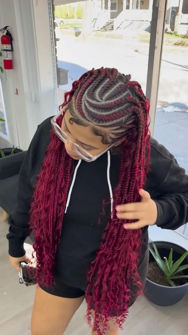 Curved feed-in cornrows with shoulder-length braids and auburn curly ends, hairstylist located in Wilkes-Barre, PA