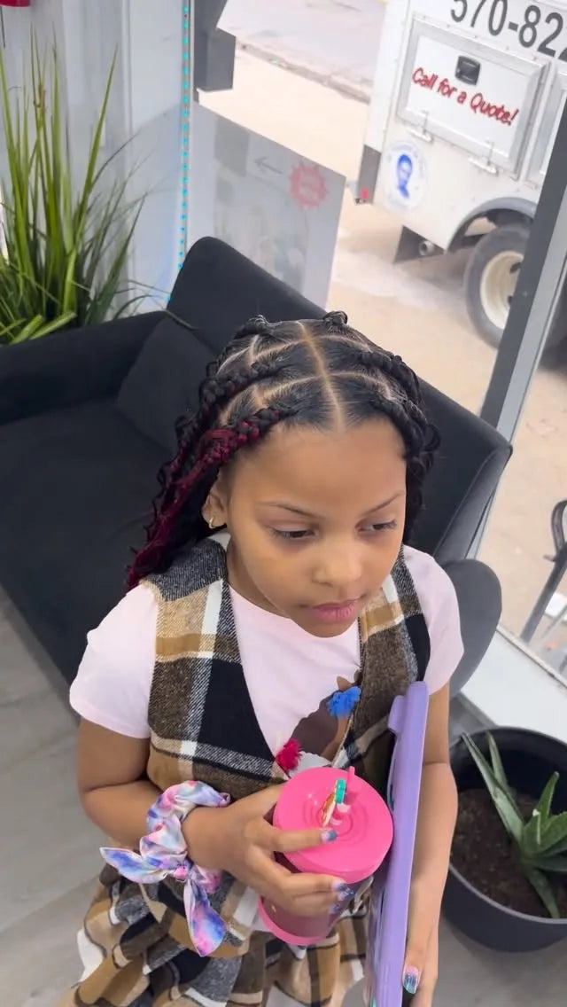 Long burgundy boho braids with curved cornrow detailing and loose curly ends, hairstylist located in Wilkes-Barre, PA