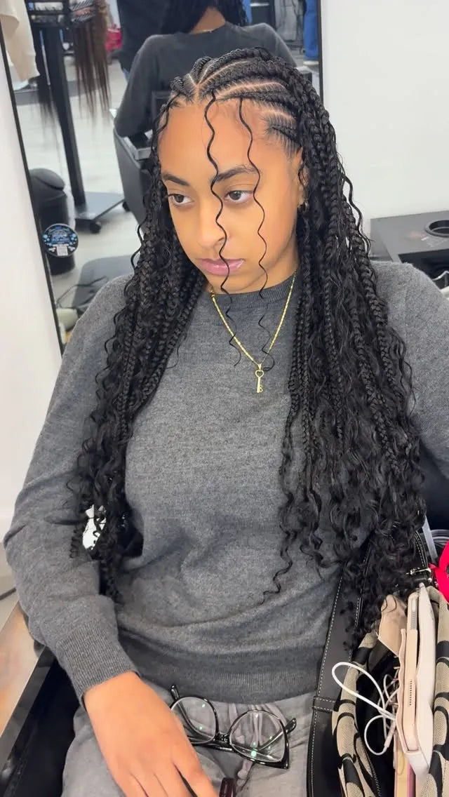 Kids’ center-part braids with burgundy extensions and loose curly accents, hairstylist located in Wilkes-Barre, PA