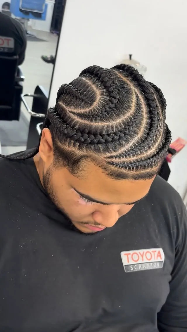Men’s stitch braids with curved scalp design and clean parts, hairstylist in Wilkes-Barre, PA