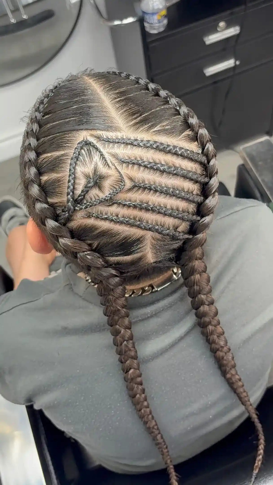 Straight-back cornrows with wavy parting and thick braided rows, hairstylist located in Wilkes-Barre, PA