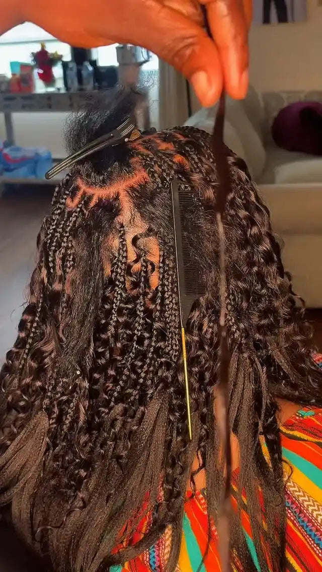 Boho braids installation with small braids and curly leave-out pieces, Stylist located in Philadelphia, PA