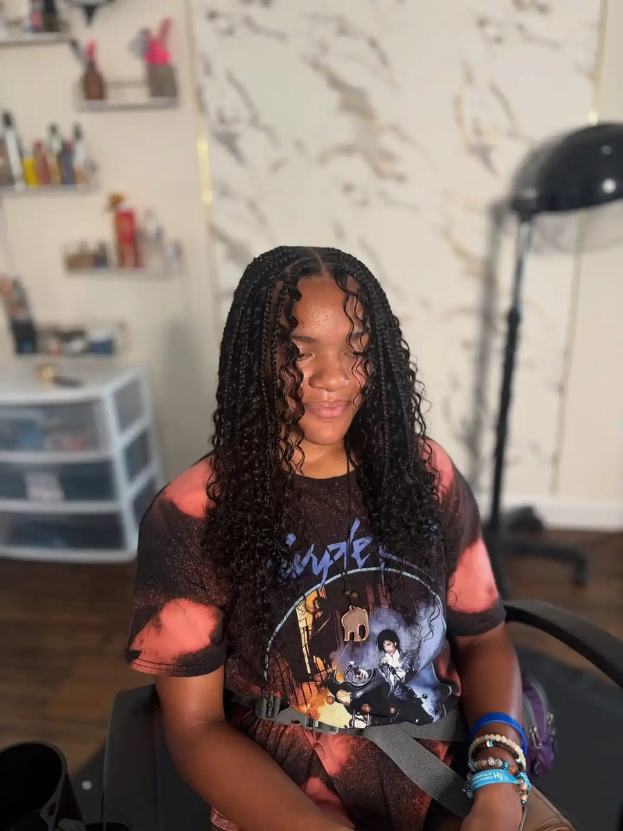 Long boho knotless braids with loose curls, Stylist located in Philadelphia, PA