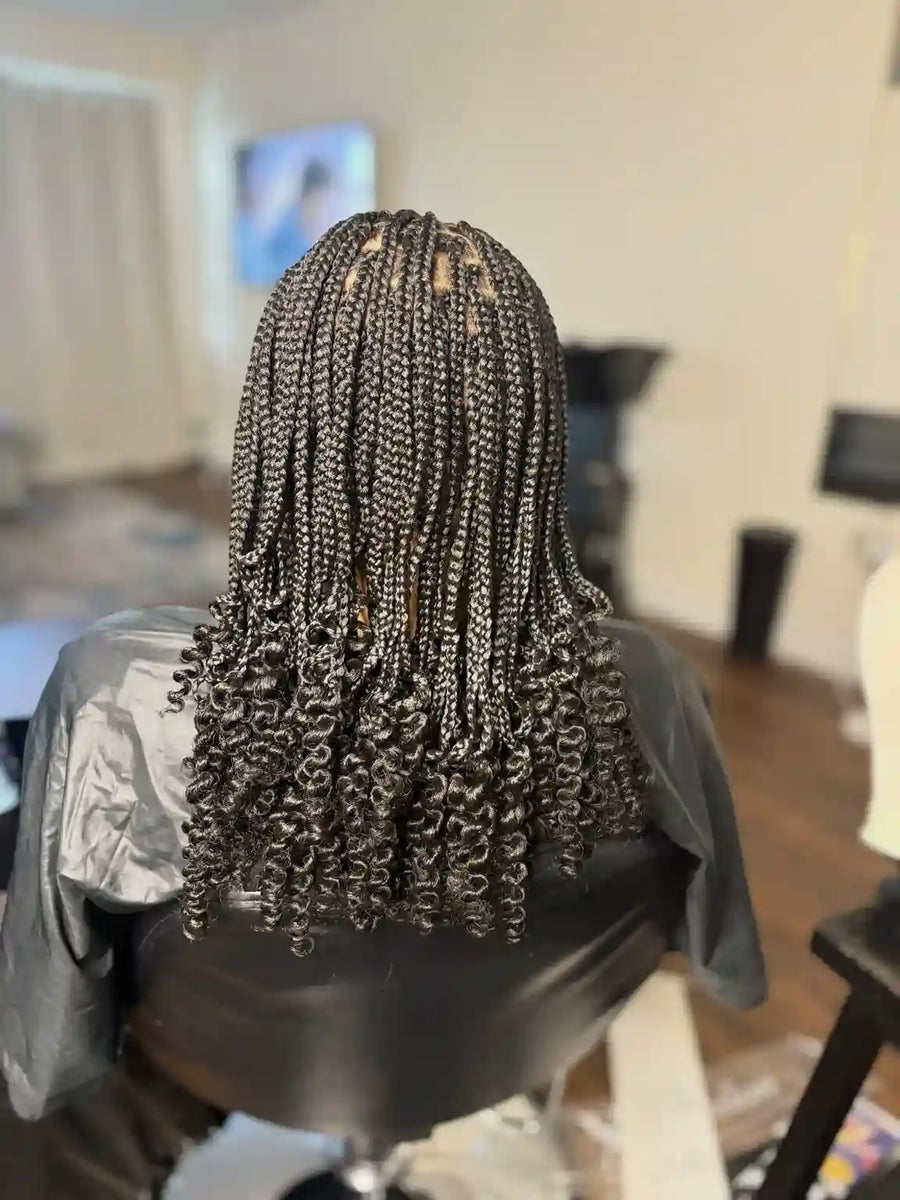 Medium box braids with spiral curly ends, Stylist located in Philadelphia, PA