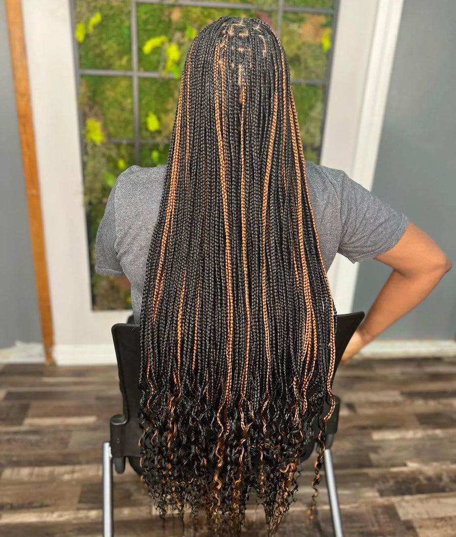 Long black and copper box braids with curly ends, hairstylist in Brooklyn, NY