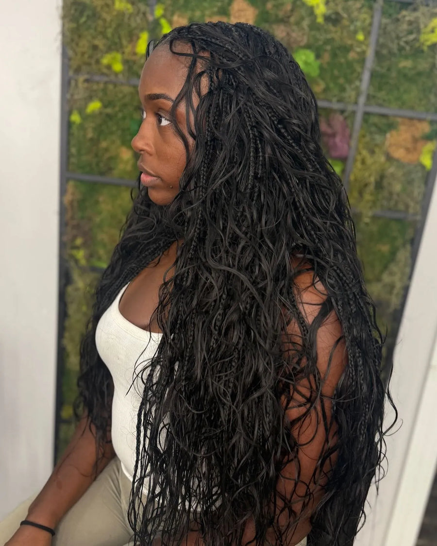 Long boho micro braids with loose wet-look waves, hairstylist in Brooklyn, NY