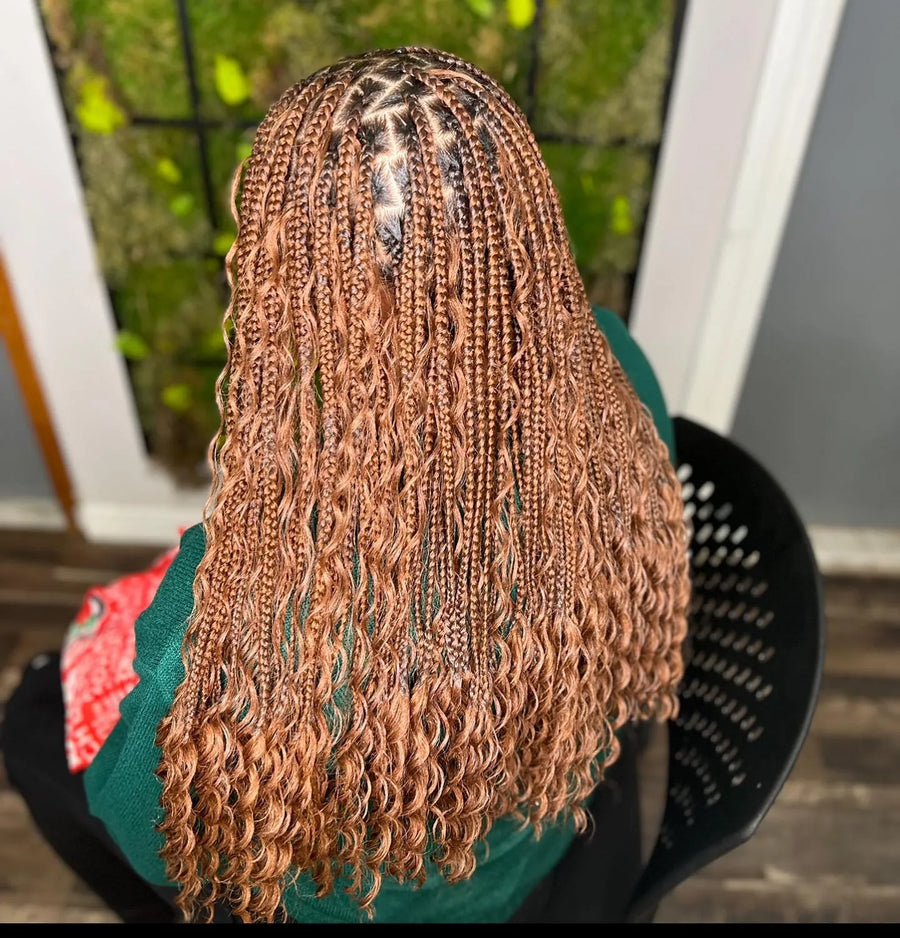 Copper boho knotless braids with curly ends and small braid sections, hairstylist in Brooklyn, NY