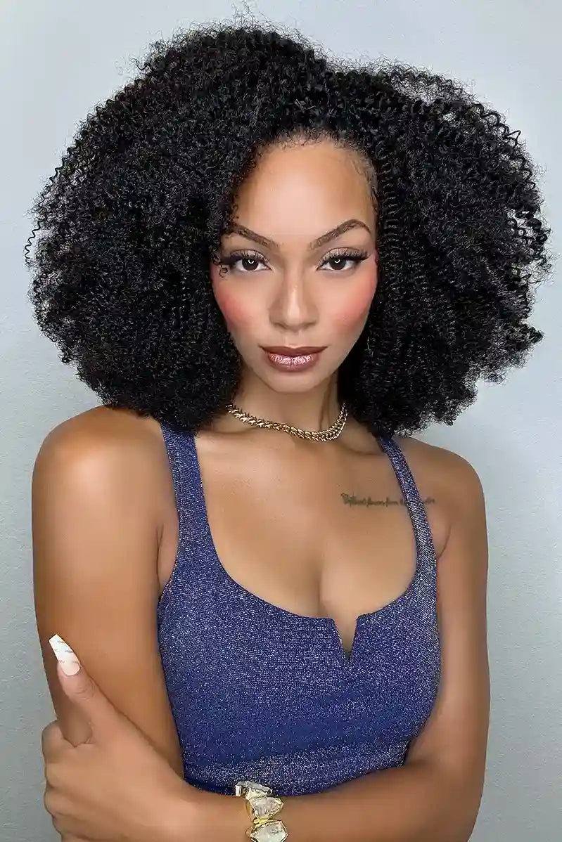 Model wearing Afro kinky curly feather crochet human hair extensions
