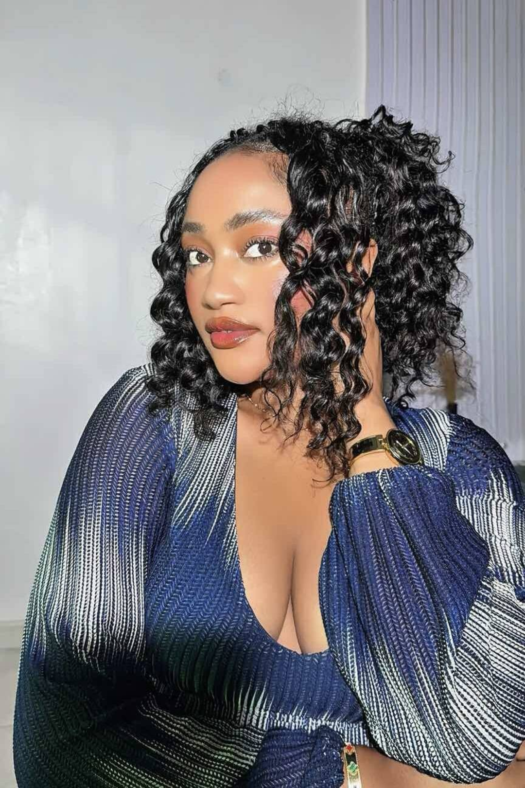 Model display picture of feather crochet hair extension loose deep wave human hair