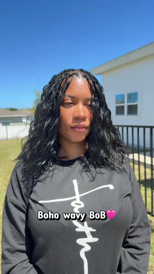 Long brown boho braids with loose waves, soft highlights, and a side part, hairstylist located in Jacksonville, FL