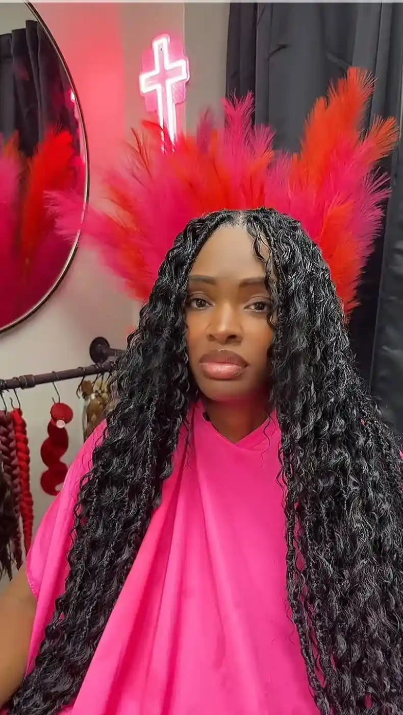 Long brown boho braids with soft loose curls and highlighted strands, hairstylist located in Jacksonville, FL