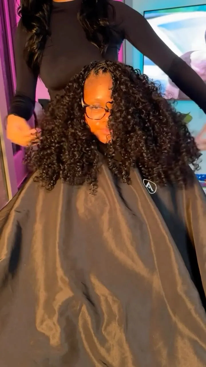 Shoulder-length curly miracle knot hairstyle with a full rounded shape and defined ringlets, hairstylist located in Lanham, MD