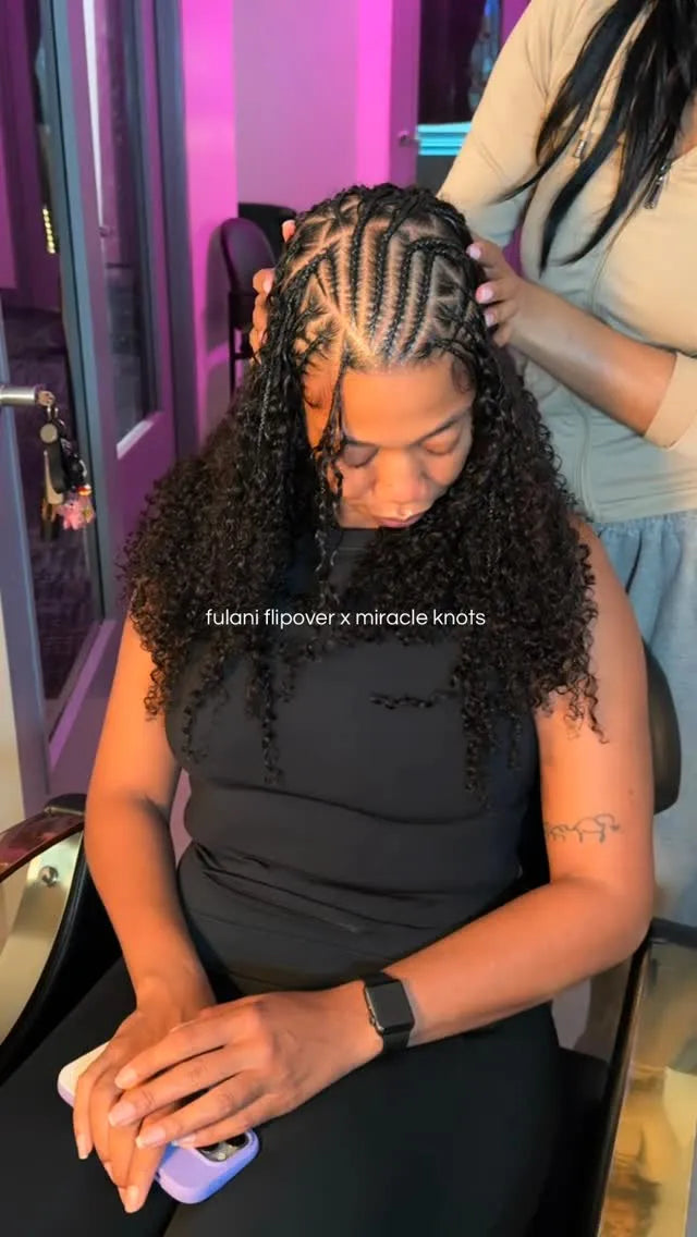 Fulani flip-over braids with detailed front cornrows and shoulder-length curly extensions, hairstylist located in Lanham, MD