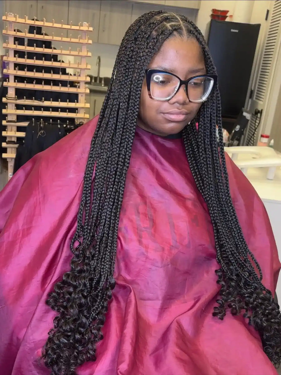 Curly half feed-in braids with black protective style, hairstylist in Buffalo, NY