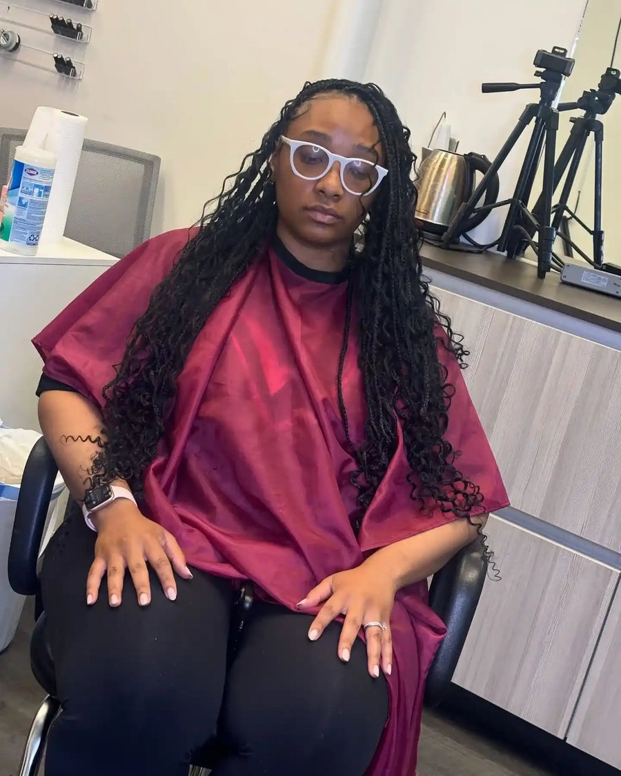 Long island twists with curly ends and white glasses styling, hairstylist in Buffalo, NY